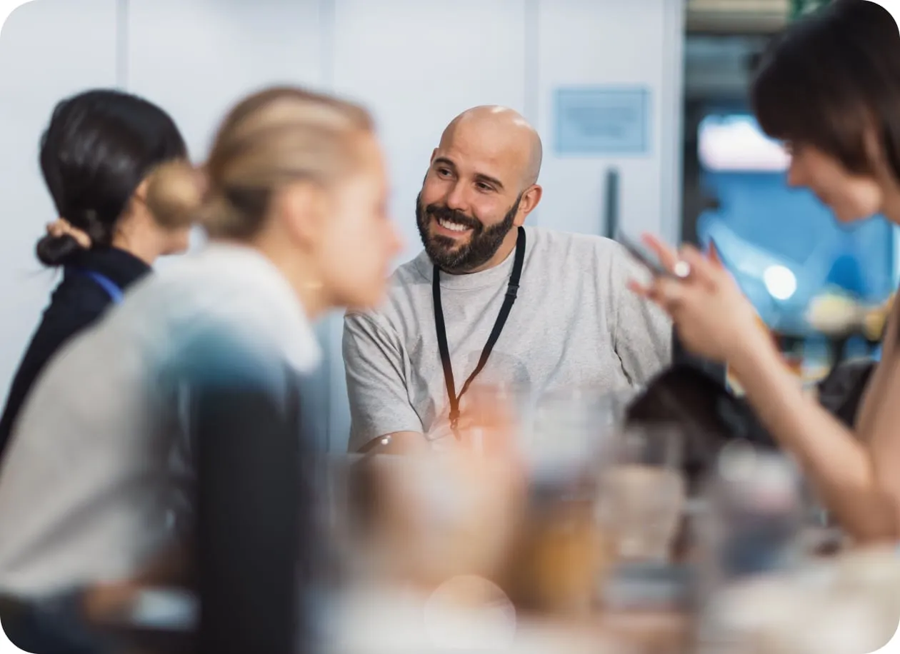 Colleagues in a lively discussion around a table